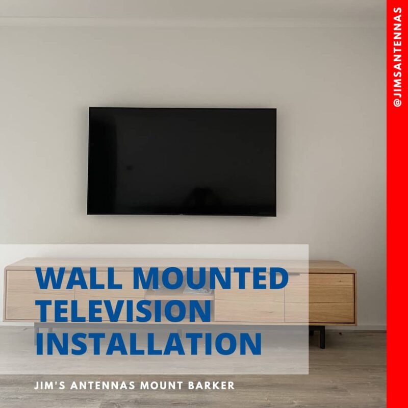 A wall mounted 65″ TV in Belair.